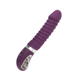 Lila vibrator med räfflad struktur och ergonomiskt handtag