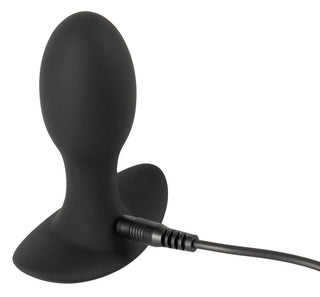 Anos Vibrerande Buttplug i svart silikon har en laddningskabel vid basen, idealisk för anallek och helt kompatibel med vattenbaserat glidmedel för ökad jämnhet.