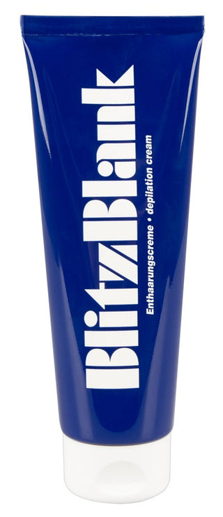 En elegant, glänsande blå tub av BlitzBlank Hårborttagningskräm står upprätt, med minimalistisk design och vit text. Den är infunderad med vårdande ingredienser för silkeslen hud och lovar effektiv hårborttagning.