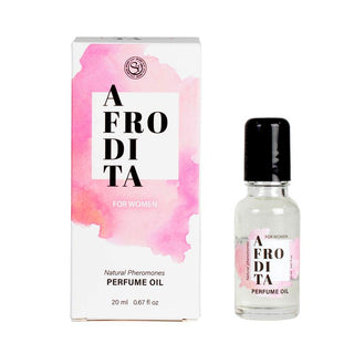 En 20 ml Feromonparfym Roll On-flaska med vitt lock visas bredvid den vita och rosa rektangulära förpackningslådan.