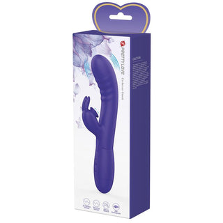 Box Cerberus Licking Rabbitvibrator med blommig förpackning och hjärtformat handtag, avsedd för klitorisstimulans och G-punkt stimulans.