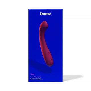 Blue box displaying a röd, vattentät Dame Arc G-punktsvibrator för klitorisstimulering, med varumärket Dame upptill.