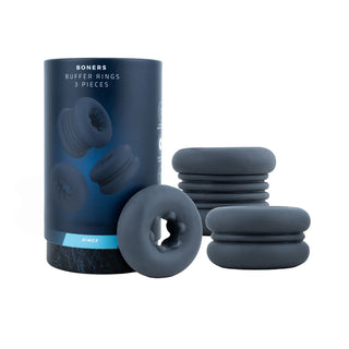 Ett 3-pack Boners Buffer Rings i grå silikon visas bredvid en blå och svart cylindrisk förpackning.
