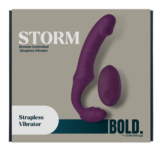Lila silikonvibrator av märket Storm, fjärrstyrd och utan axelband, samt fjärrkontroll i förpackning.