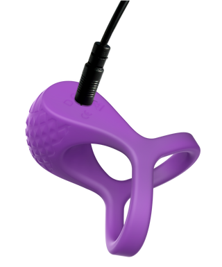 Lila silikonvibrator med dubbla ringar och strukturerad yta.