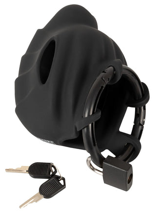 Ett Black Velvets Kyskhetsbur-set innehåller en cylindrisk svart silikonmask med en öppning och två silvernycklar med räfflade texturer och svarta låsbar nyckelomslag, vilket lägger till sofistikering till den spännande designen.