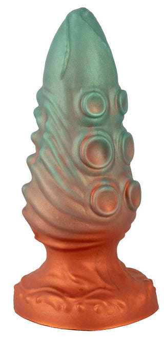 Beasty Cocks Atlantis Buttplug är en orange och grön silikonplugg med fantasy-tema med texturerade åsar, upphöjda cirkulära mönster och en robust sugkoppsbas. Tillverkad av flytande silikon för en mjuk känsla.