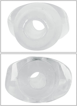 Analpluggar i genomskinlig silikon med centrala tunnlar, som visas från olika vinklar. Genomskinligt material med ringformad design.