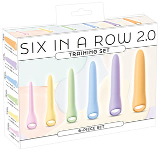 Förpackning innehållande sex pastellfärgade silikondilatatorer med en slät, avsmalnande form, placerade i en rad.