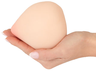 Beau Cœur Felyra Peach-masturbator, formad som en persika med en ljusrosa spets.