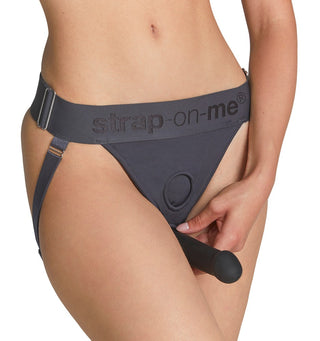 Svart Unique Strap-on Harness Jock med en avtagbar svart dildo, med justerbara remmar och säker öppning.