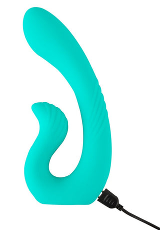 NAIRA Dual Heads Vibrator - en turkos, böjlig silikonvibrator med dubbel ände, 10 vibrationslägen och laddningskabel fäst vid basen.