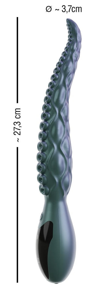 Octo Vibes Tentacle Vibrator i mörkgrönt premiumsilikon med tentakeldesign och sugkoppsdetaljer, cirka 27,3 cm lång och 3,7 cm i diameter.