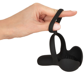 Svart silikonvibrator av märket Rebel Pung för perinealmassage.