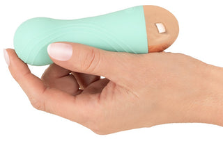 Mintgrön och roséguld Cuties Dual Density-minivibrator tillverkad av silikon med dubbel densitet.