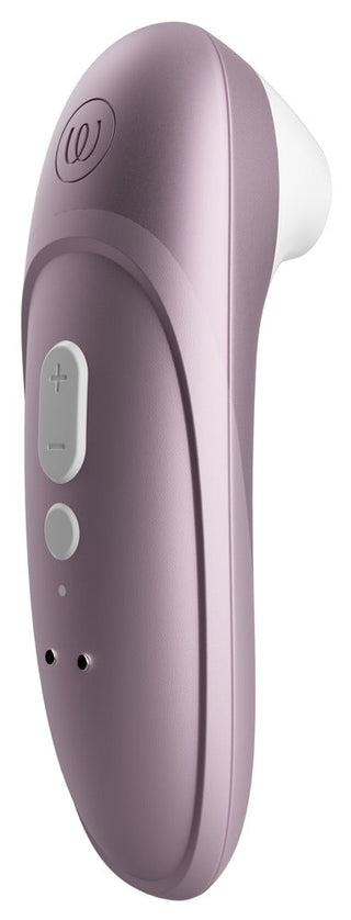 Mauve trådlös öronsnäcka och mauve Womanizer Pro klitorisstimulator med silikonspetsar visas sida vid sida.