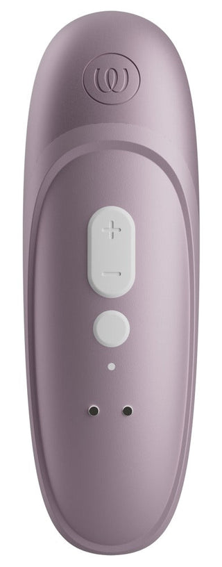 Handhållen klitorisstimulator i vit silikon med böjd design, plus/minus-knappar, strömbrytare och LED-indikatorlampor.
