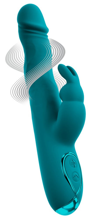En turkosfärgad silikonvibrator i rabbit-modell med strukturerad yta, böjd arm, vattentät konstruktion och ett vågmönster som visar vibrationsstyrkan.