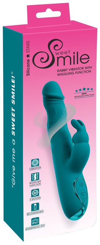 Rosa kaninvibrator i vattentätt material med rörlig design och vågformade detaljer.