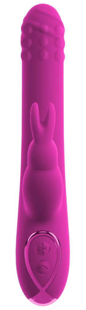 Fuchsiafärgad kaninvibrator med strukturerad skaft, roterande massagepärlor och knappar på basen.