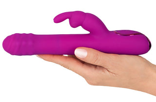 Lila kaninvibrator med roterande kulor, strukturerad skaft och böjd stimulator.