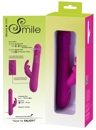 Lila kaninvibrator med roterande massagepärlor i sin förpackning.