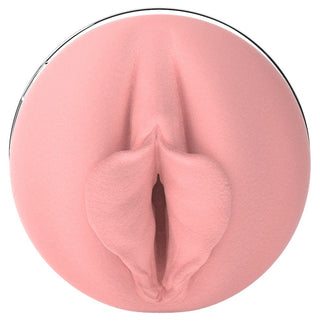 Vibrerande och uppvärmd manlig masturbator i silikon med realistisk vulva-design, visad uppifrån mot en vit bakgrund.