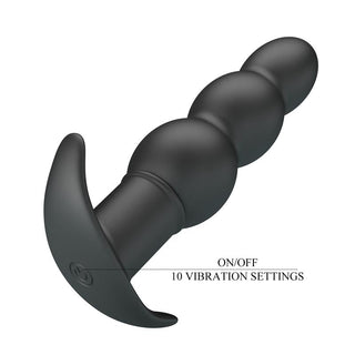 Svart analplugg i mjuk silikon med pärldesign samt tydliga knappar, 10 vibrationslägen.