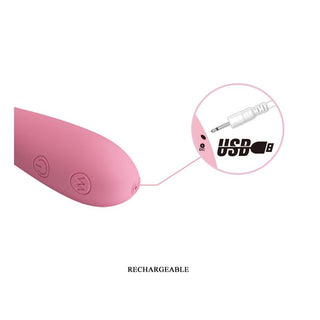 Rosa silikonvibrator med kontrollknappar och USB-laddningsport, med en smidig, ergonomisk design.