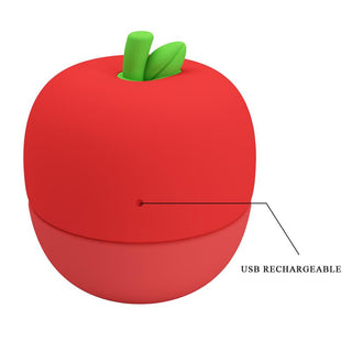 Röd äppelformad stimulator med kompakt design, slätt material och liten USB-laddningsport.