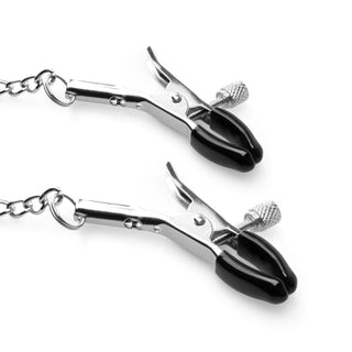 Nipple Clamps med Silikon Gagring, med svarta handtag sammankopplade med kedjor, visas mot en vit bakgrund.