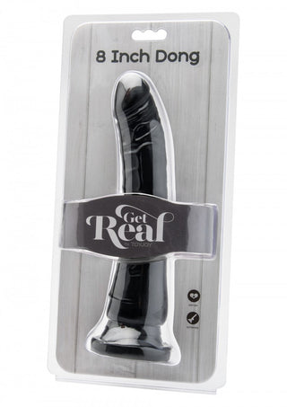 Get Real 20 cm Sugproppsdildon i svart förpackning med en säker stark sugpropp är inställd mot en träbakgrund.