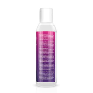 En plastflaska med vitt lock med en lila och rosa gradientetikett, med tät vit text som beskriver dess CE-märkt status. Easyglide silikonsmörjmedel är designat för långvarig effekt, mot en vanlig vit bakgrund.