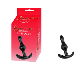 Svart silikonbuttplugg, perfekt för nybörjare, bredvid sin röda och guldfärgade T-Plug 01 Buttplug 8 cm-förpackning. Tillverkad av kroppssäkert material för trygg och njutbar användning.