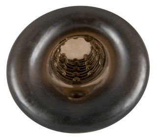 En närbild nerför en glänsande svart spiraltrappa skapar en fascinerande, tunnelliknande effekt, som påminner om den intrikata designen hos Rebel Dick & Ball Penis Sleeve.