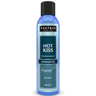 Den 150 ml blå flaskan Feromon Olja, märkt Hot Kiss, förstärker attraktion och intimitet. Perfekt för massage och avkoppling, den erbjuder en förtrollande upplevelse med sin feromoninfunderade doft.