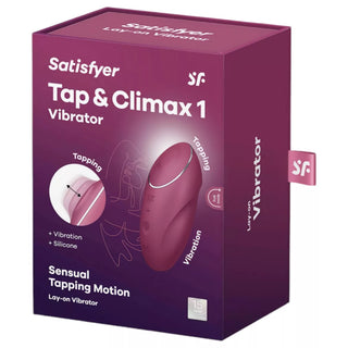 Röd silikonvibrator med dubbla funktioner, presenterad i förpackning med produktfoto och viktiga egenskaper.