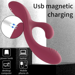 Rosa silikon rabbitvibrator med dubbel stimulans, uppvärmningsfunktion och USB-magnetladdning, samt laddningsenheter.